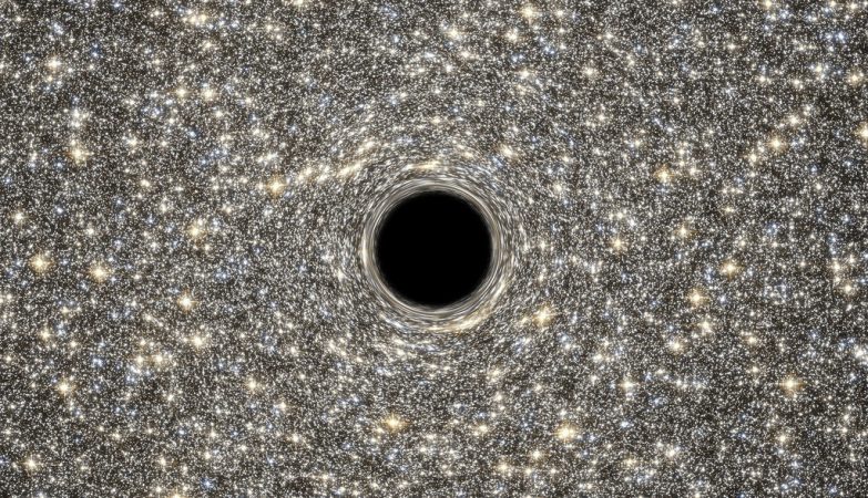 A galáxia ultra-densa M60-UCD1 com o seu buraco ngro supermassivo, conceit artístico