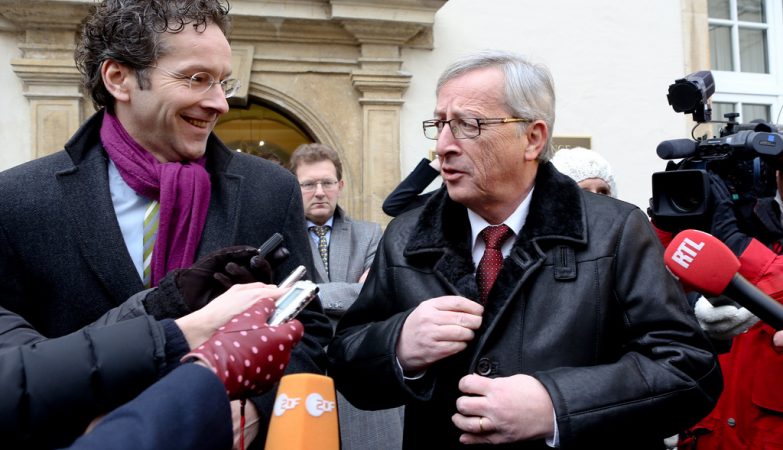 O presidente do Eurogrupo, o holandês Jeroen Dijsselbloem, com o presidente da Comissão Europeia, Jean-Claude Juncker