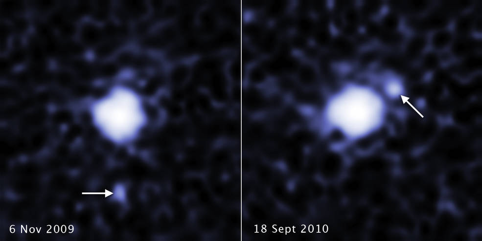 Estas duas imagens, separadas por um período de quase um ano, revelam uma lua em órbita do planeta anão 2007 OR10