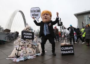 Manifestação durante a COP26, em Glasgow, Grã-Bretanha
