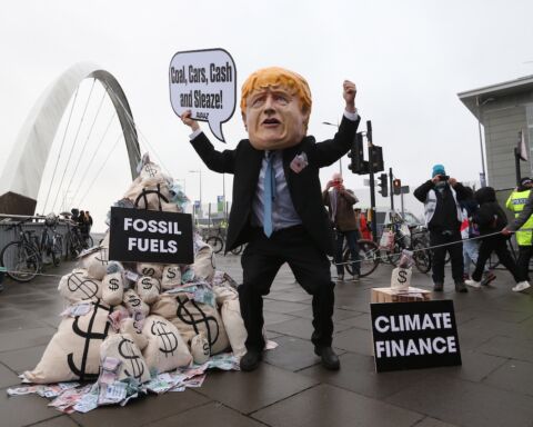 Manifestação durante a COP26, em Glasgow, Grã-Bretanha