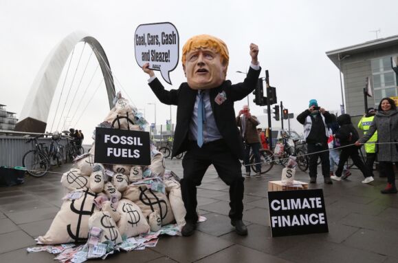 Manifestação durante a COP26, em Glasgow, Grã-Bretanha