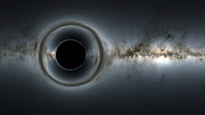 Ilustração da NASA mostra um buraco negro solitário no Espaço, com a sua gravidade a distorcer a visão de estrelas e galáxias ao fundo.
