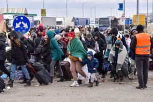 Refugiados ucranianos na fronteira com a Polónia.