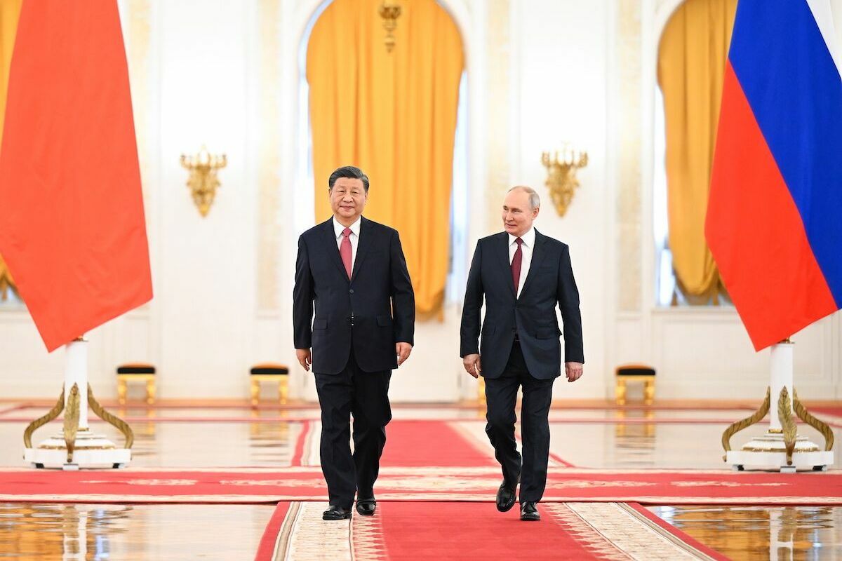 Putin mengecam “neo-kolonialisme” keuangan pada malam kunjungan ke Cina